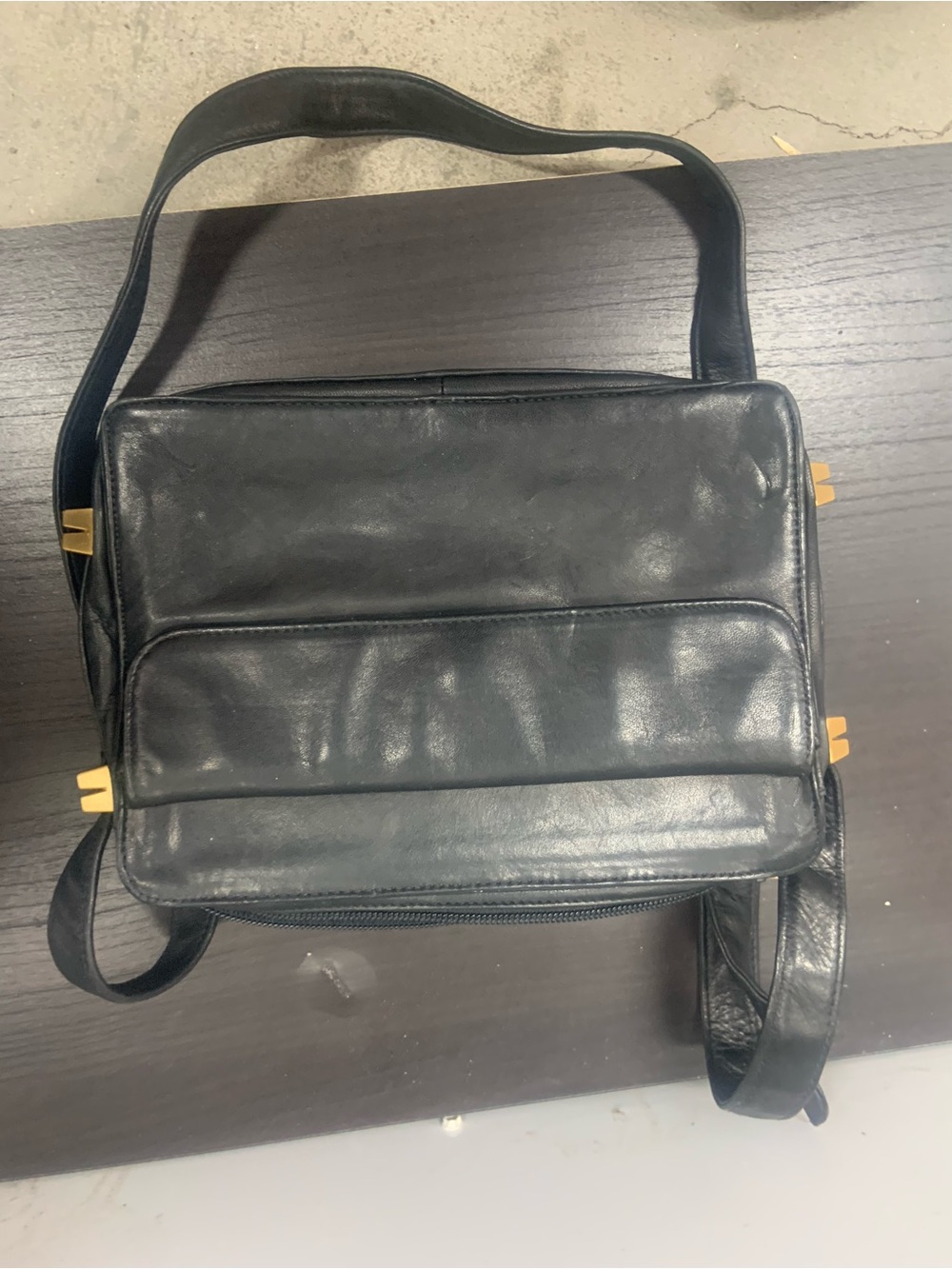 Perlina Black Leather Messenger Bag with Gold Accents